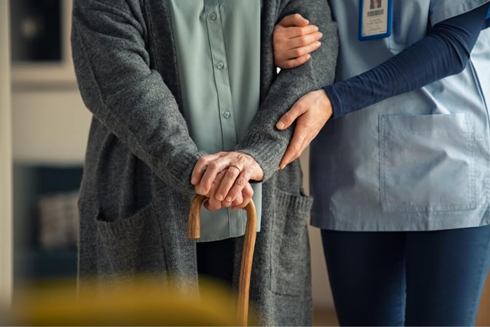 aged care facility cane walking assistance